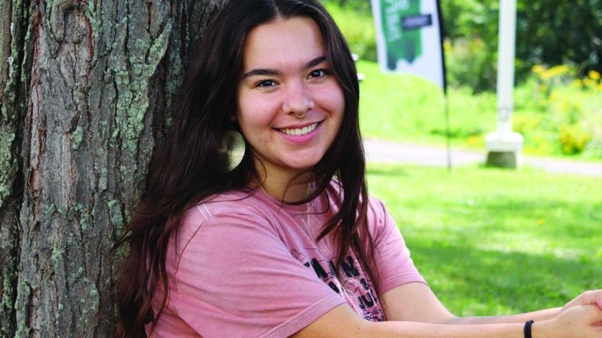 Kylie Golden-Appleton sitting outdoors