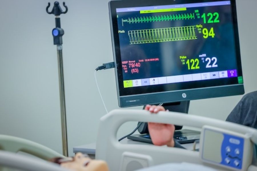 hospital bed with a vital sign monitors